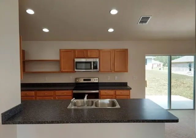 Photo 2 of Single family home for sale at 15492 Sw 34th Court Rd, Ocala, FL 34473 | MLS# O6403500 | Listing updated on 2026-08-31