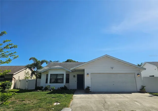 Photo 1 of Single family home for sale at 1885 Feather Tree Cir, Clearwater, FL 33765 | MLS# TB8503446 | Listing updated on 2026-06-01
