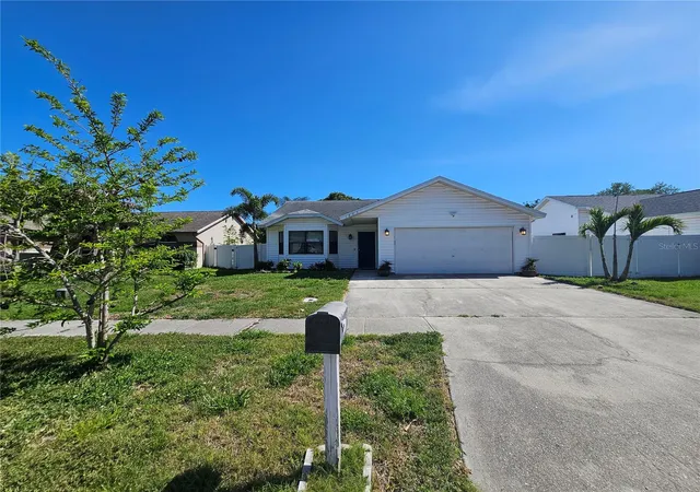 Photo 2 of Single family home for sale at 1885 Feather Tree Cir, Clearwater, FL 33765 | MLS# TB8503446 | Listing updated on 2026-06-01