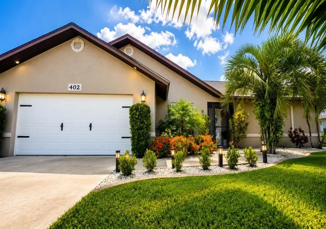Photo 1 of Single family home for sale at 402 SW 37th Lane, CAPE CORAL, FL 33914 | MLS# C7525571 | Listing updated on 2026-10-07