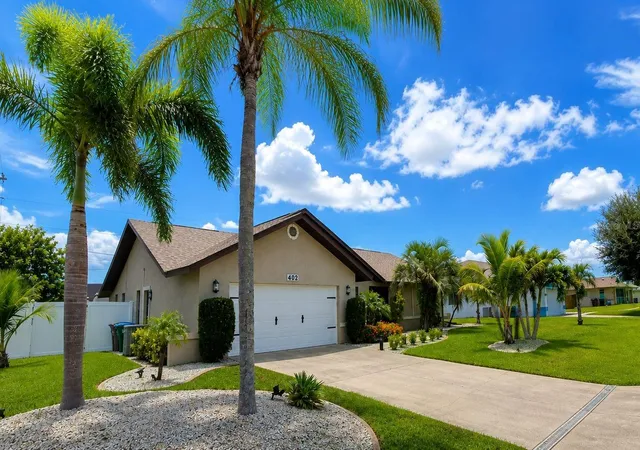 Photo 2 of Single family home for sale at 402 SW 37th Lane, Cape Coral, FL 33914 | MLS# C7525571 | Listing updated on 2026-10-07