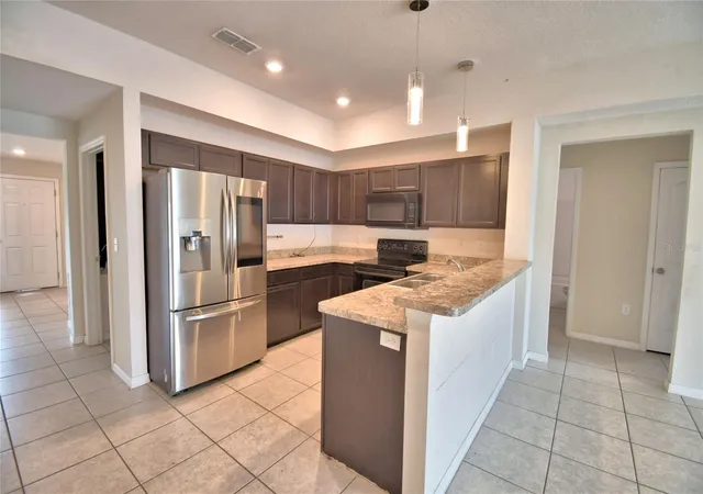Photo 4 of Sale Pending at 17 Zinnia Ln E, Kissimmee, FL 34759 | MLS# P4938594 | Listing updated on 2026-08-05