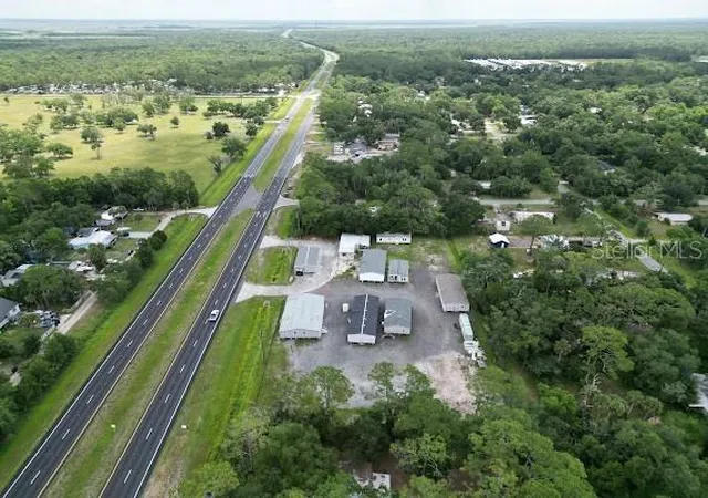 1st image of 25164 E Colonial Dr, Christmas, FL 32709 | MLS# O6403624
