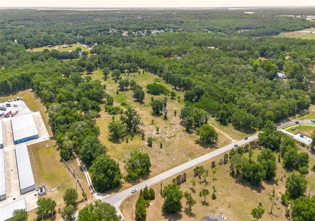 1st image of 0 Rolling Acres Rd, Lady Lake, FL 32159 | MLS# OM723851