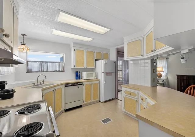 Photo 3 of Manufactured home for sale at 322 Robalo, North Port, FL 34287 | MLS# TB8503634 | Listing updated on 2026-09-22