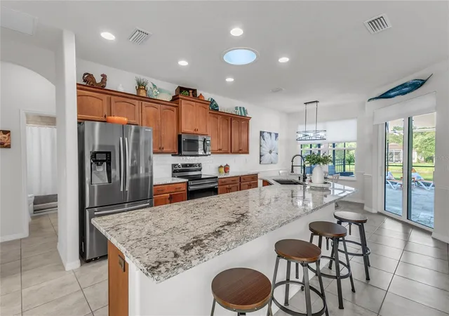 5th image of 113 Arena Lake Dr, Palm Coast, FL 32137 | MLS# FC318196