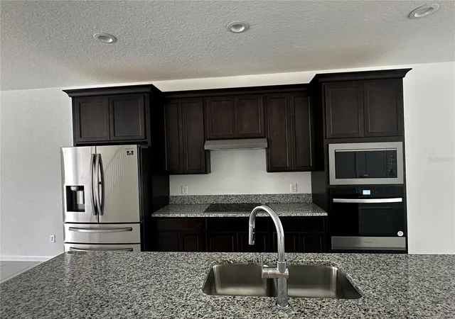 Photo 3 of Townhouse for sale at 14099 Lochend Way, Winter Garden, FL 34787 | MLS# O6404015 | Listing updated on 2026-07-24