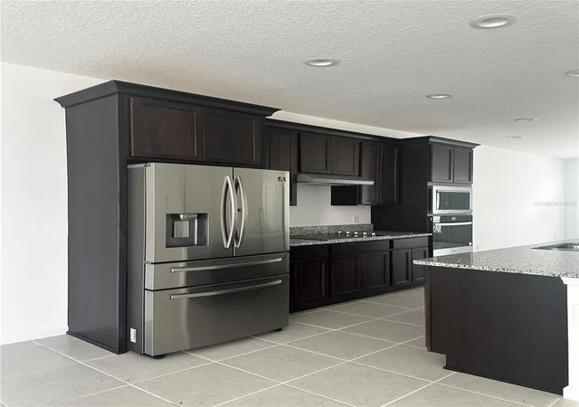 Photo 4 of Townhouse for sale at 14099 Lochend Way, Winter Garden, FL 34787 | MLS# O6404015 | Listing updated on 2026-07-24