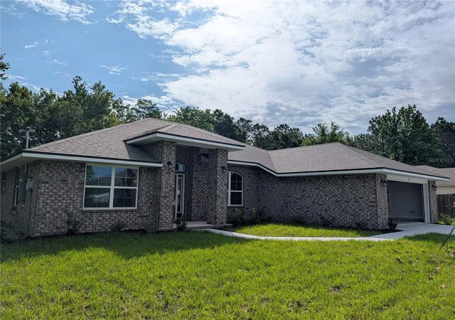 Photo 3 of Single family home for sale at 128 Bird Of Paradise Dr, Palm Coast, FL 32137 | MLS# O6404093 | Listing updated on 2026-09-05