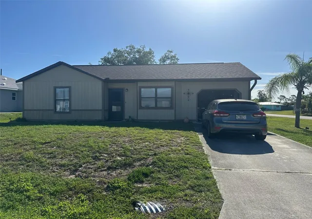 Photo 1 of Single family home for sale at 807 Haleybury St, Port Charlotte, FL 33948 | MLS# C7525666 | Listing updated on 2026-09-05