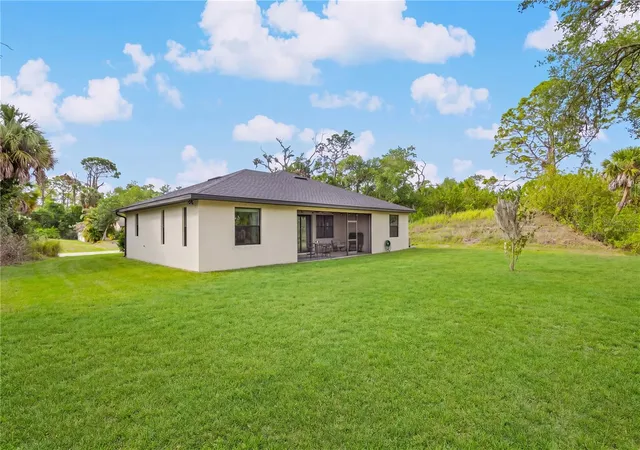 Photo 4 of Single family home for sale at 241 Hoffer St, Port Charlotte, FL 33953 | MLS# C7525671 | Listing updated on 2026-08-13