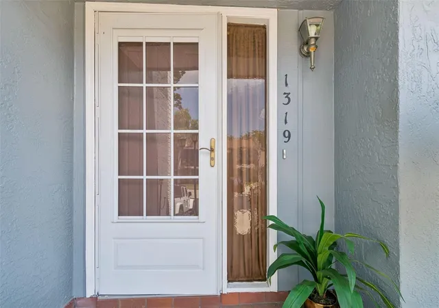 Photo 3 of Townhouse for sale at 1319 Abbey Crescent Ln, Clearwater, FL 33759 | MLS# TB8504296 | Listing updated on 2026-09-11