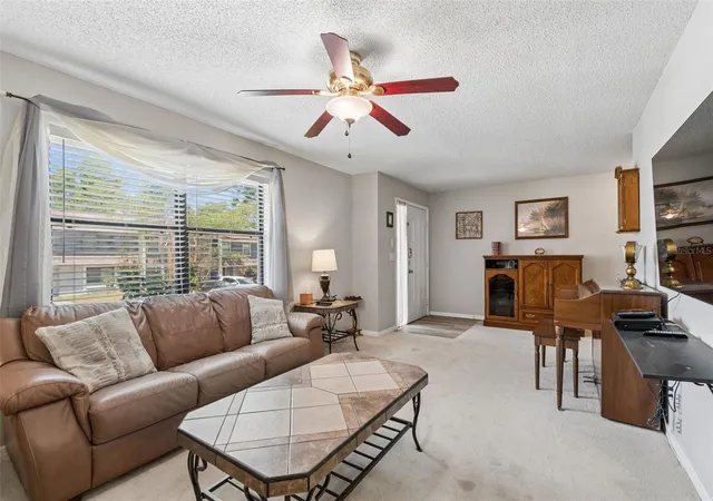 Photo 3 of Townhouse for sale at 1319 Abbey Crescent Ln, Clearwater, FL 33759 | MLS# TB8504296 | Listing updated on 2026-09-11