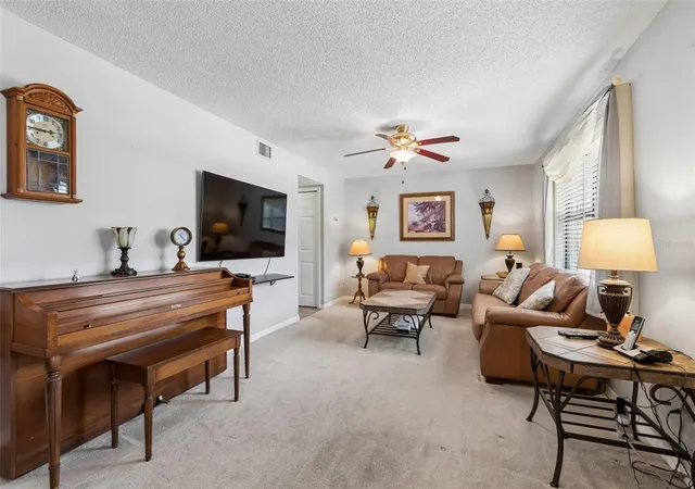 Photo 4 of Townhouse for sale at 1319 Abbey Crescent Ln, Clearwater, FL 33759 | MLS# TB8504296 | Listing updated on 2026-09-11