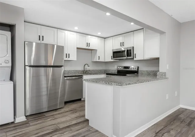 Photo 1 of Condo for sale at 1281 Pine Ridge Cir E #A2, Tarpon Springs, FL 34688 | MLS# TB8504413 | Listing updated on 2026-09-21