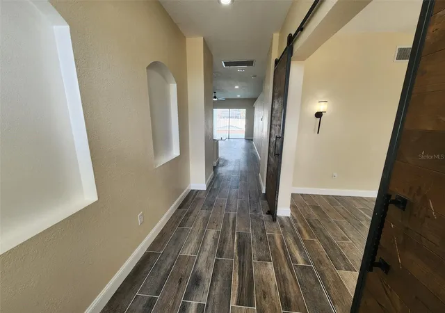 Photo 4 of Single family home for sale at 29545 Morwen Pl, Wesley Chapel, FL 33543 | MLS# W7885420 | Listing updated on 2026-09-02
