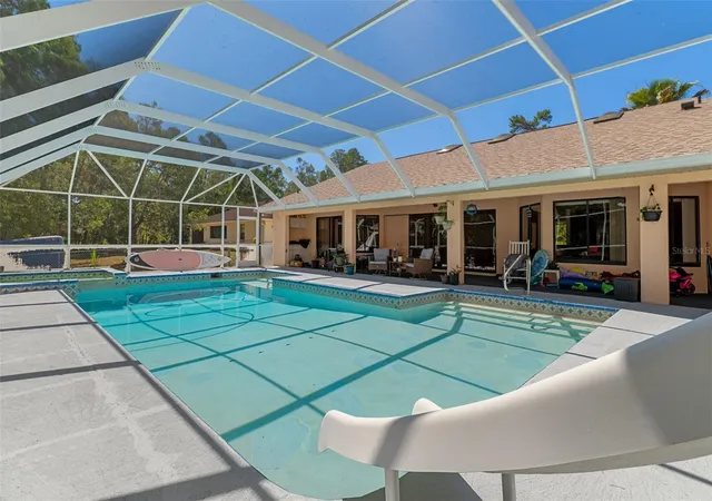 Photo 3 of Single family home for sale at 8959 Nakoma Way, Weeki Wachee, FL 34613 | MLS# W7885423 | Listing updated on 2026-08-20