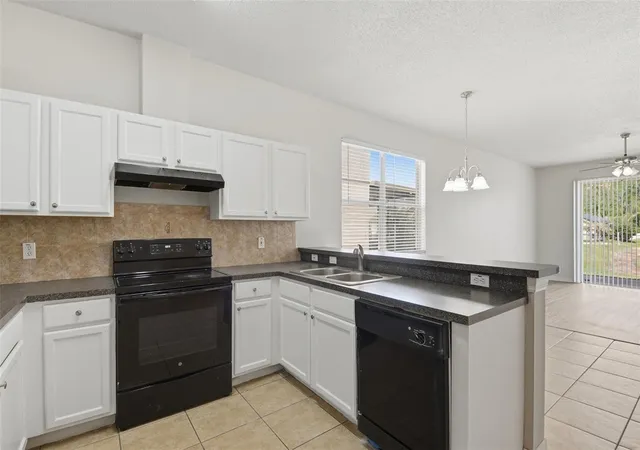 Photo 3 of Sale Pending at 949 Whispering Cypress Ln, Orlando, FL 32824 | MLS# O6404431 | Listing updated on 2026-08-20