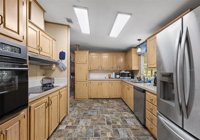 Photo 3 of Manufactured home for sale at 6689 SE 55th Street, Trenton, FL 32693 | MLS# GC540023 | Listing updated on 2026-09-28