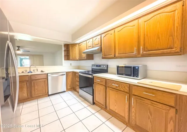 Photo 4 of Townhouse for sale at 2193 Kings Cross St, Titusville, FL 32796 | MLS# O6404516 | Listing updated on 2026-10-05