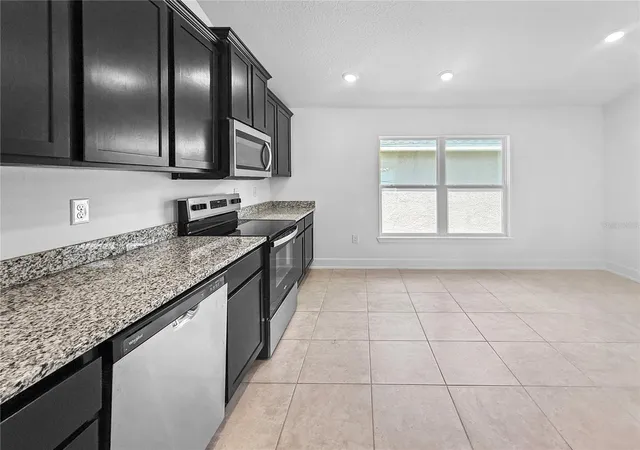 Photo 4 of Single family home for sale at 7612 Bent Tree Loop, Harmony, FL 34773 | MLS# O6404629 | Listing updated on 2026-09-16