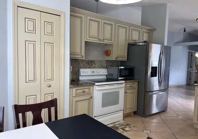Photo 3 of Single family home for sale at 4125 Hampshire Village Ct, Orlando, FL 32822 | MLS# TB8504987 | Listing updated on 2026-10-25