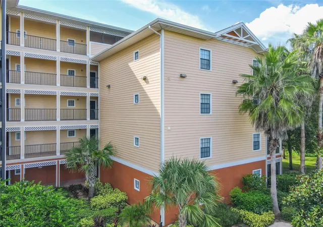 Listing Photo 1 - Condo for sale in building located at 3050 Pirates Retreat Ct, Kissimmee, FL 34747 - Unit #207