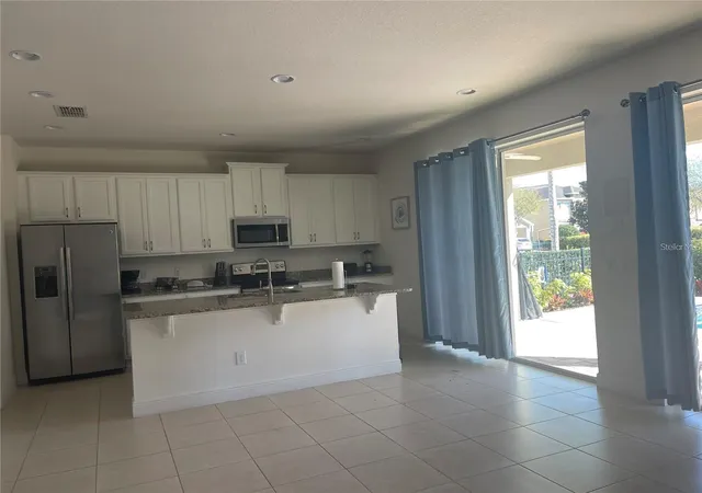 Photo 2 of Single family home for sale at 210 Pendant Ct, Kissimmee, FL 34747 | MLS# O6404820 | Listing updated on 2026-05-12