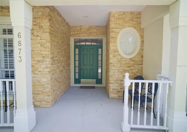 Photo 3 of Single family home for sale at 6873 Scythe Ave, Orlando, FL 32812 | MLS# O6404838 | Listing updated on 2026-07-14