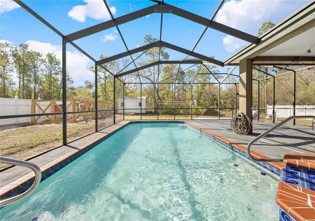 4th image of 13040 Quigley Ave, Weeki Wachee, FL 34614 | MLS# TB8505140