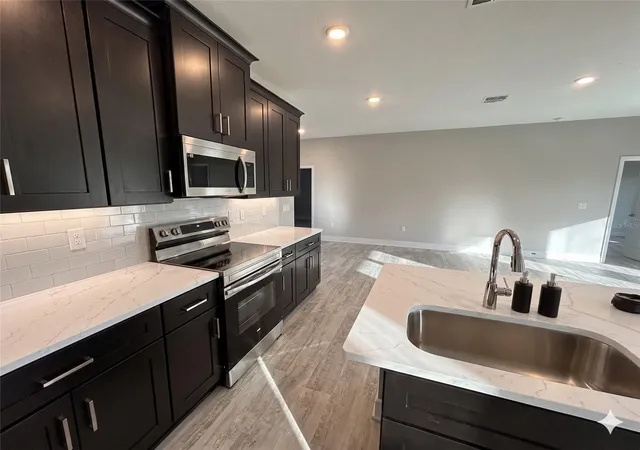 Photo 3 of Single family home for sale at 2039 E Newhaven St, Inverness, FL 34453 | MLS# TB8505156 | Listing updated on 2026-07-16