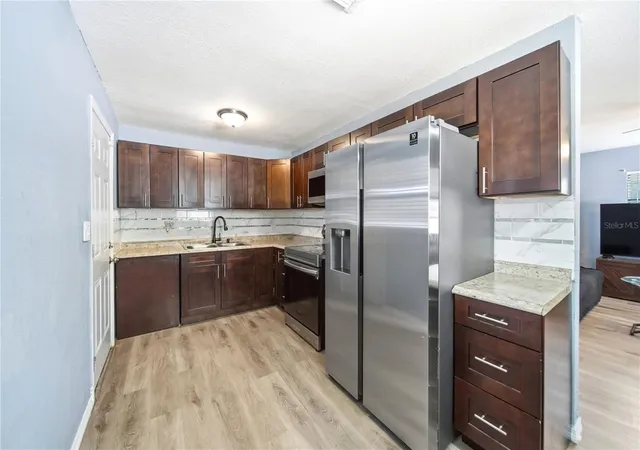 Homes for sale in Orlando, FL | 1401 Radleigh Pl, Orlando, FL 32808 | MLS# O6405066