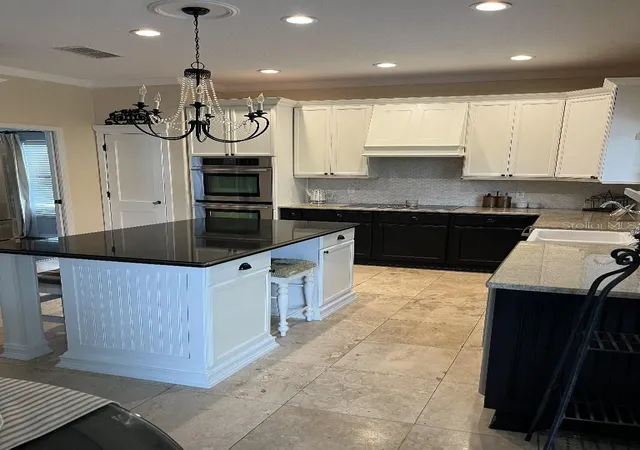 Photo 2 of Single family home for sale at 5879 Lake Melrose Dr, Orlando, FL 32829 | MLS# TB8505480 | Listing updated on 2026-09-19