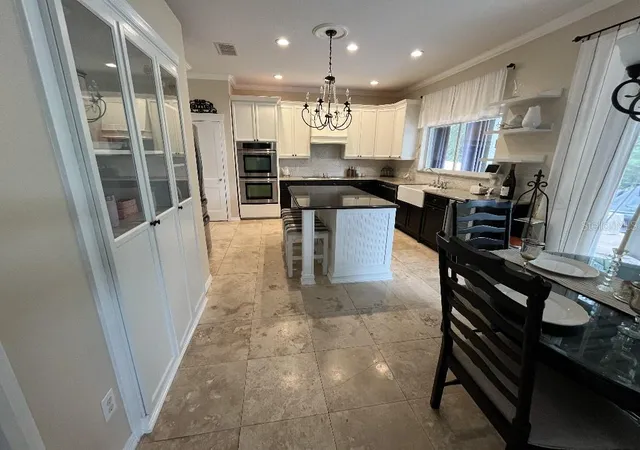 Photo 3 of Single family home for sale at 5879 Lake Melrose Dr, Orlando, FL 32829 | MLS# TB8505480 | Listing updated on 2026-09-19