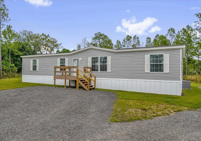 Photo 3 of Manufactured home for sale at 9165 Luna Dr, St Cloud, FL 34773 | MLS# S5149303 | Listing updated on 2026-09-02