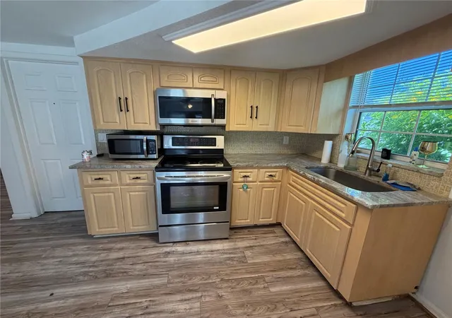 Photo 4 of Single family home for sale at 9331 Rainbow Ln, Port Richey, FL 34668 | MLS# TB8505590 | Listing updated on 2026-06-25