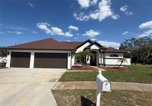 Photo 3 of Single family home for sale at 8137 Golden Bear Loop, Port Richey, FL 34668 | MLS# TB8505631 | Listing updated on 2026-08-06