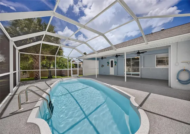 Photo 2 of Single family home for sale at 881 Riviera Ln Nw, Port Charlotte, FL 33948 | MLS# C7525817 | Listing updated on 2026-10-20