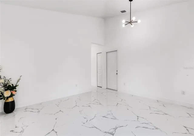 Photo 4 of Single family home for sale at 806 W Lowry Ln, Tampa, FL 33604 | MLS# TB8505684 | Listing updated on 2026-08-11