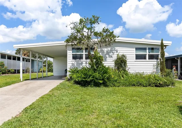 Photo 2 of Manufactured home for sale at 717 W Coach N Four Dr, Leesburg, FL 34748 | MLS# G5111988 | Listing updated on 2026-06-26