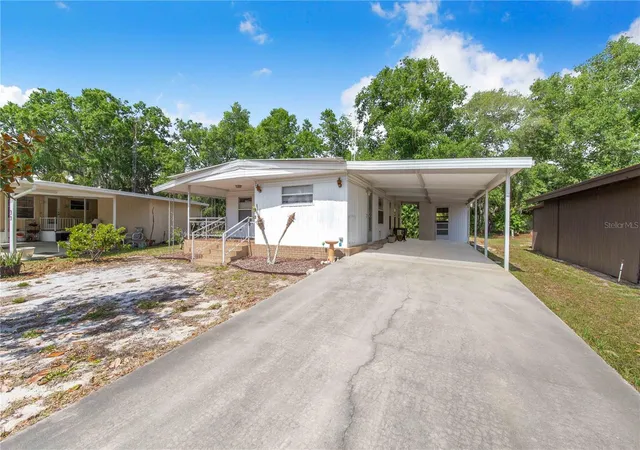 Photo 2 of Manufactured home for sale at 31 Woodland Cir, Haines City, FL 33844 | MLS# P4938645 | Listing updated on 2026-09-18
