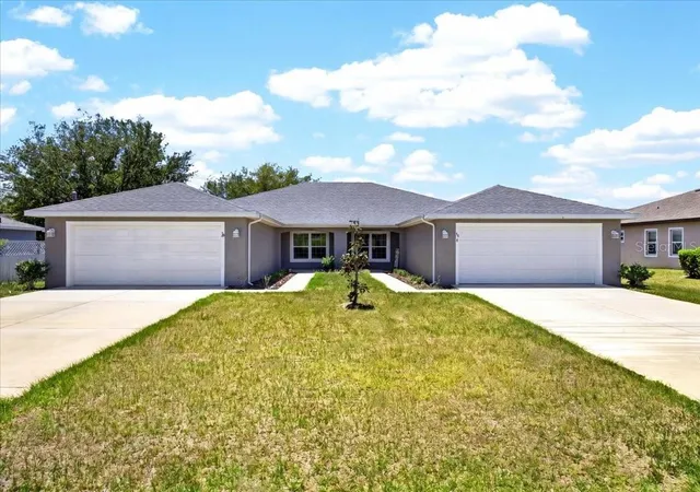1st image of 36 Louisburg Ln #A & B, Palm Coast, FL 32137 | MLS# FC318332