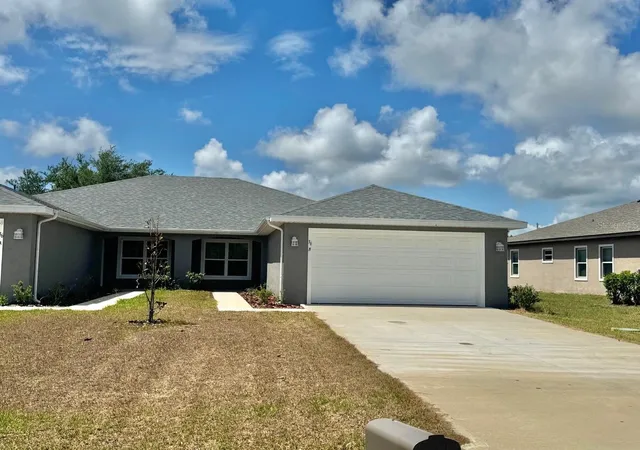 2nd image of 36 Louisburg Ln #A & B, Palm Coast, FL 32137 | MLS# FC318332