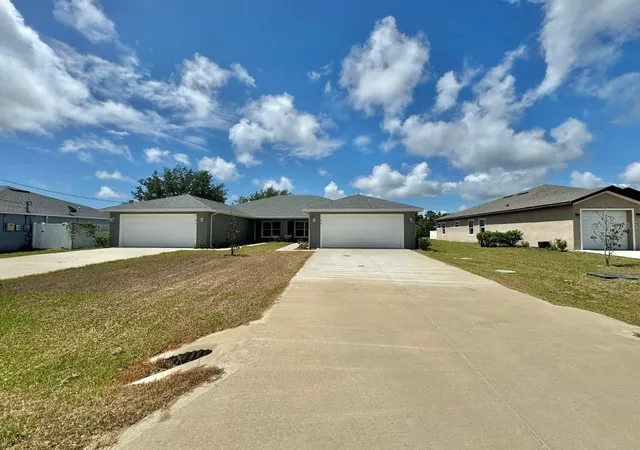 37th image of 36 Louisburg Ln #A & B, Palm Coast, FL 32137 | MLS# FC318332