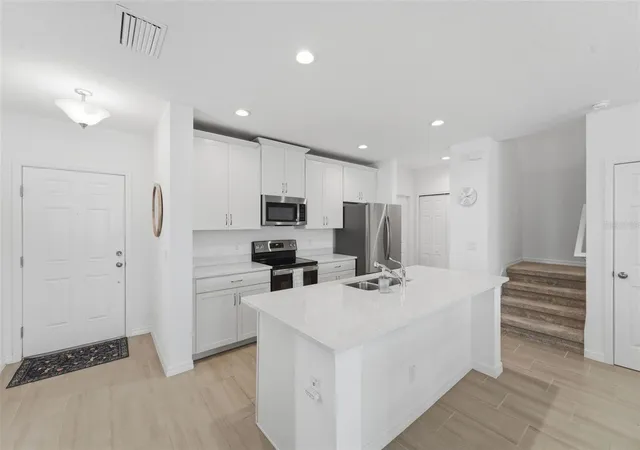 Photo 3 of Townhouse for sale at 1255 Wispy Cypress Dr, Kissimmee, FL 34746 | MLS# V4948931 | Listing updated on 2026-09-03