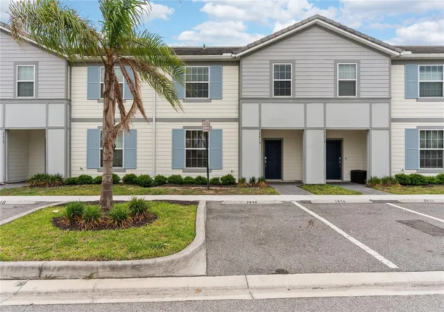 Photo 1 of Townhouse for sale at 7614 Oak Spring Ln, Davenport, FL 33837 | MLS# O6405510 | Listing updated on 2026-09-11