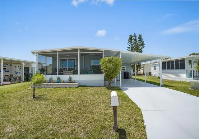 Photo 1 of Manufactured home for sale at 512 Imperial Dr, North Port, FL 34287 | MLS# A4692809 | Listing updated on 2026-09-13