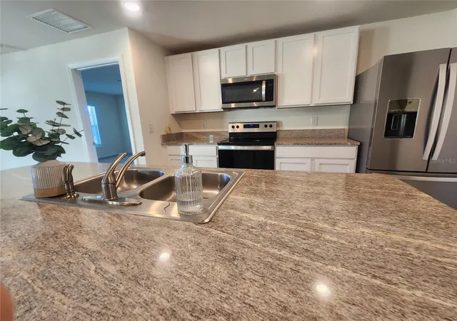 Photo 3 of Single family home for sale at 8696 Sw 49th Circle, Ocala, FL 34476 | MLS# OM724236 | Listing updated on 2026-09-18