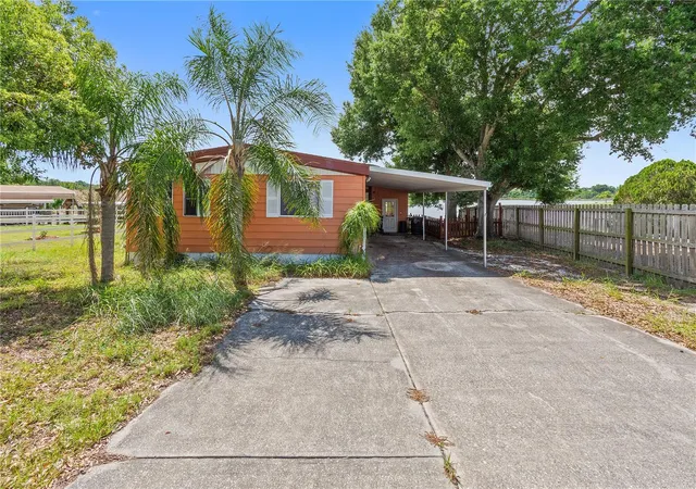 Photo 2 of Manufactured home for sale at 1025 Carver St, Lake Wales, FL 33853 | MLS# K4903477 | Listing updated on 2026-08-20