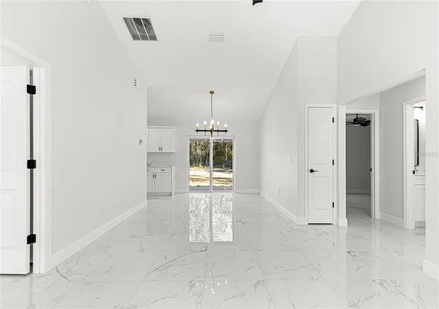 Photo 4 of Single family home for sale at 10325 SE 125th Lane, Belleview, FL 34420 | MLS# OM724272 | Listing updated on 2026-09-15